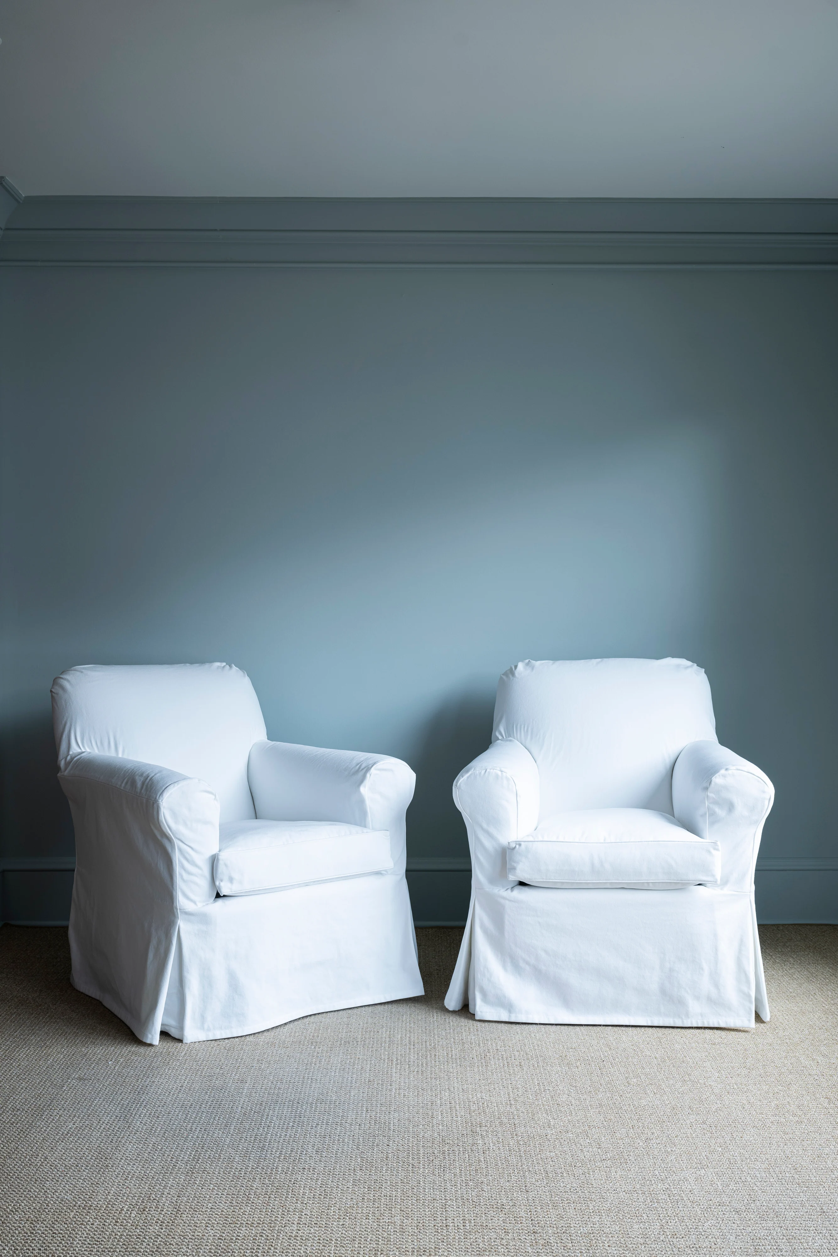 Pair of White Slipcovered Chairs
