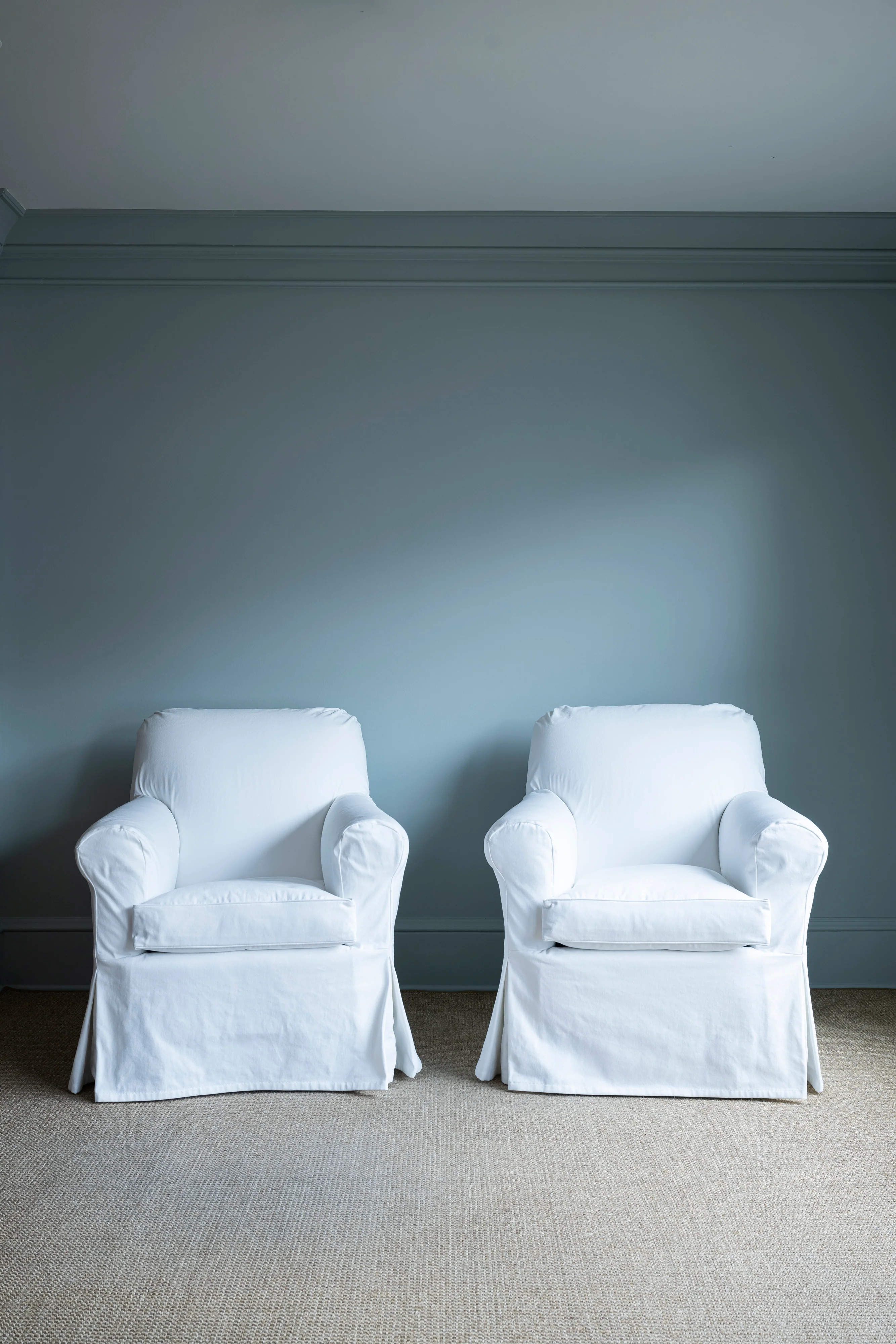 Pair of White Slipcovered Chairs