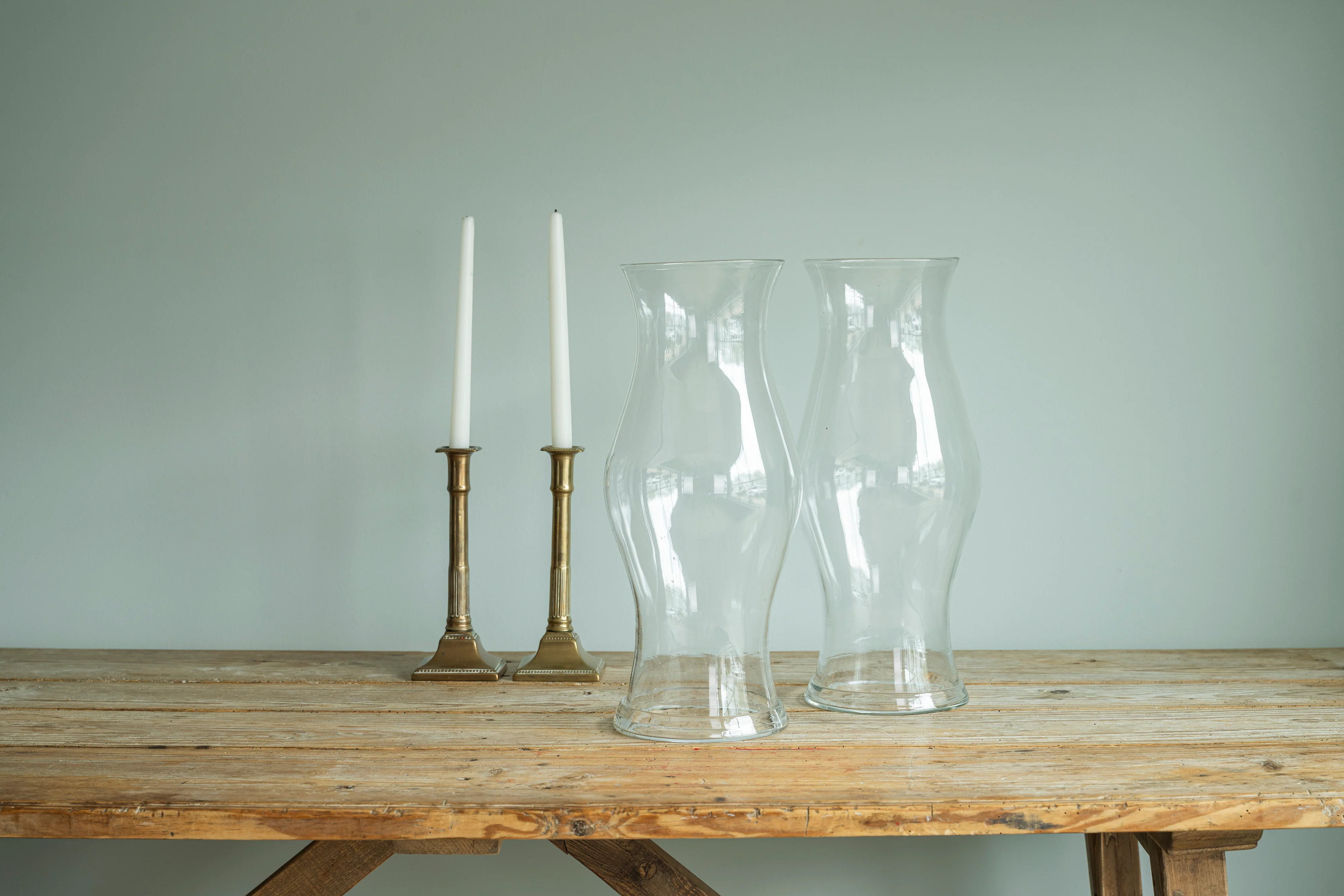 Pair of Brass Candlesticks and Glass Hurricanes