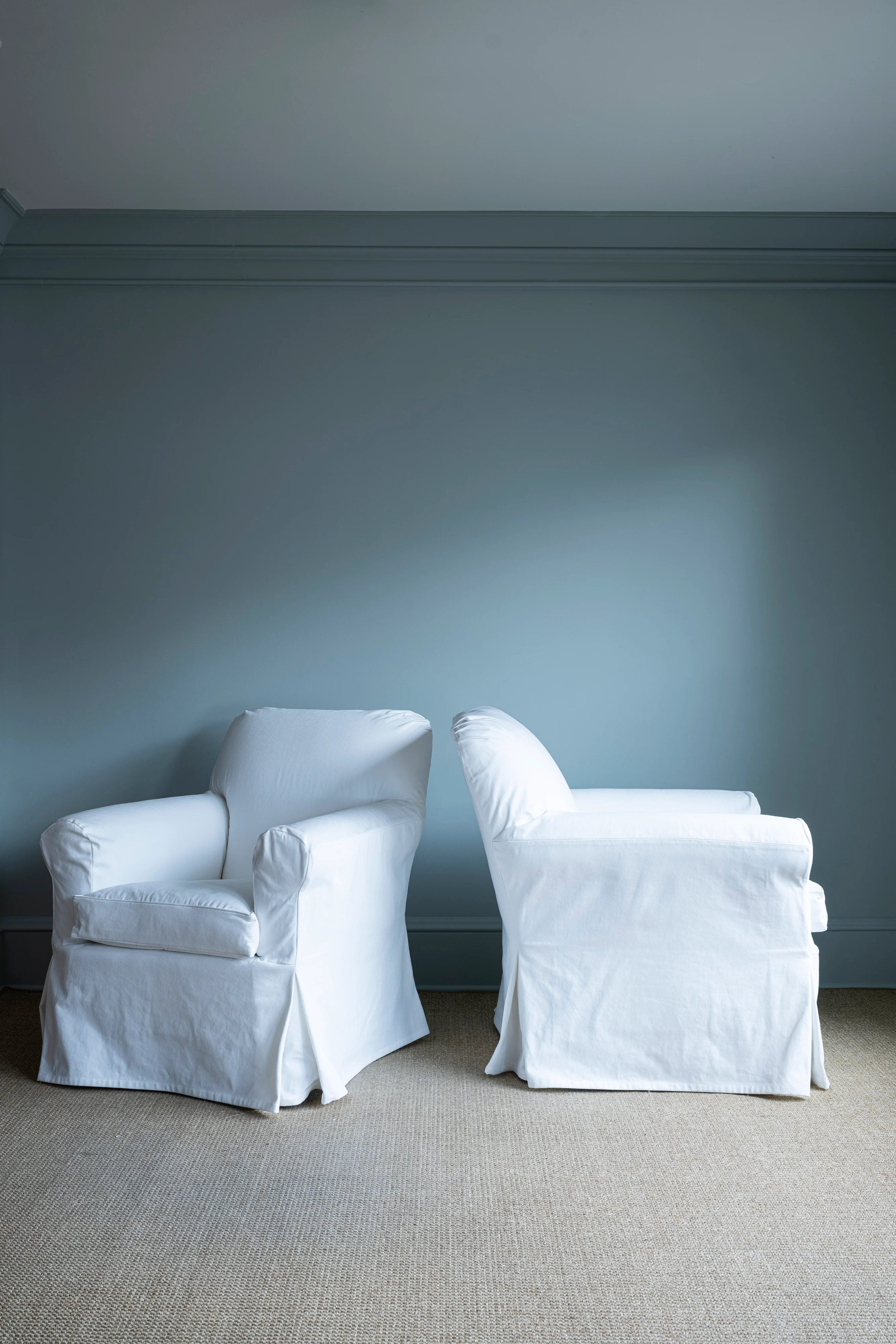 Pair of White Slipcovered Chairs